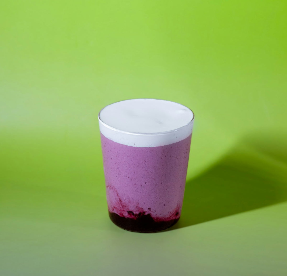 Ube cold foam recipe: lilac foam layered on iced cold brew coffee