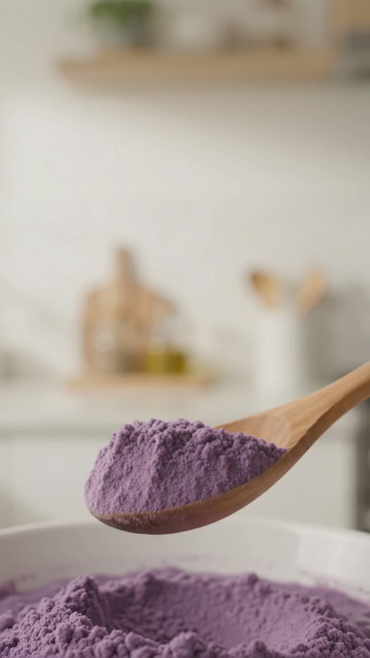 Stirring a creamy ube latte