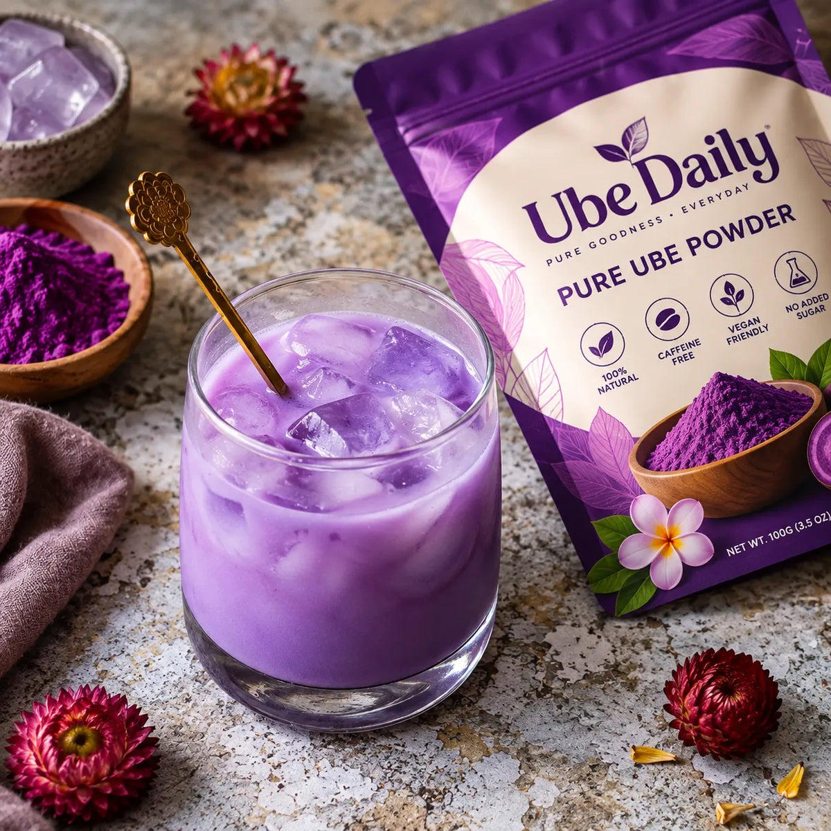 Ube Daily pouch next to a creamy purple ube latte